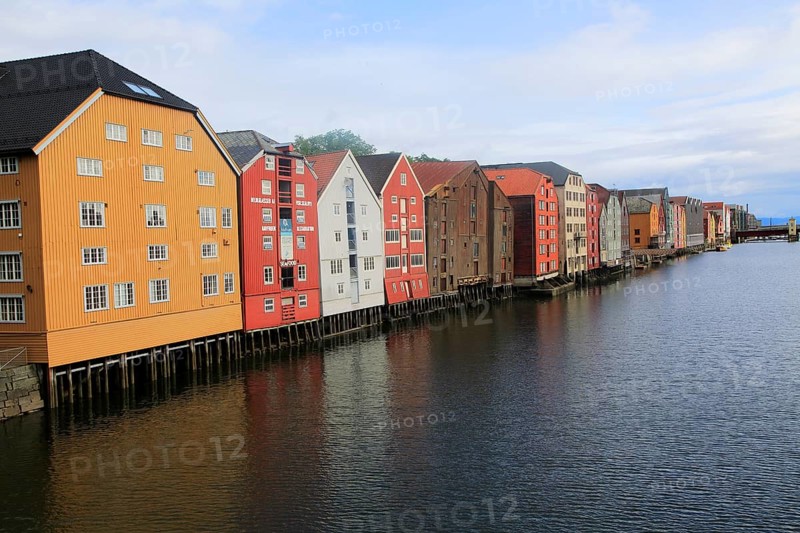 Historic waterside warehouse buildings on River Nidelva, Bryggene, Trondheim, Norway, Europe