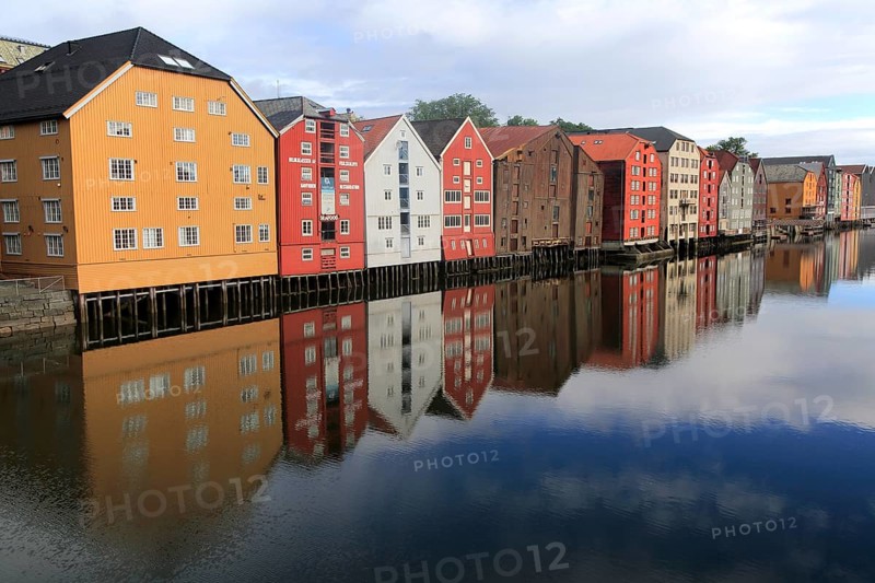 Historic waterside warehouse buildings on River Nidelva, Bryggene, Trondheim, Norway, Europe