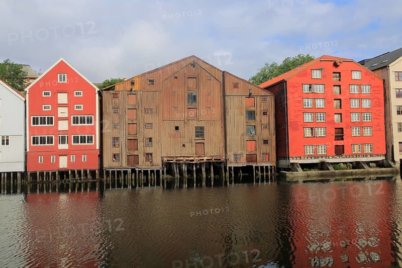 Historic waterside warehouse buildings on River Nidelva, Bryggene, Trondheim, Norway, Europe