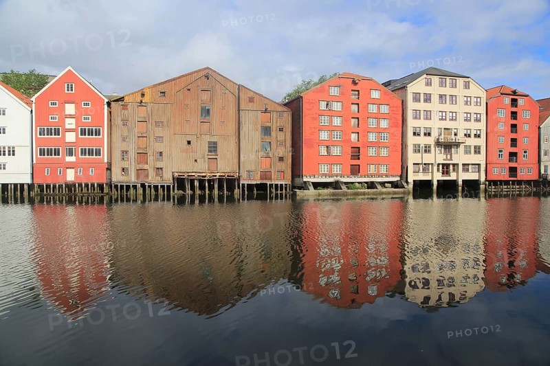Historic waterside warehouse buildings on River Nidelva, Bryggene, Trondheim, Norway, Europe