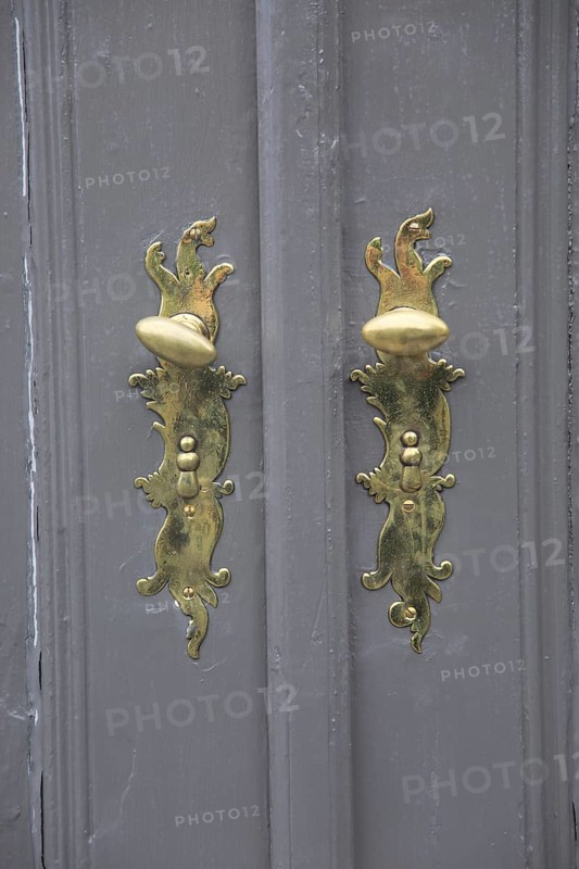 Gold door handles, Stiftsgarden palace in city of Trondheim, Norway, Europe