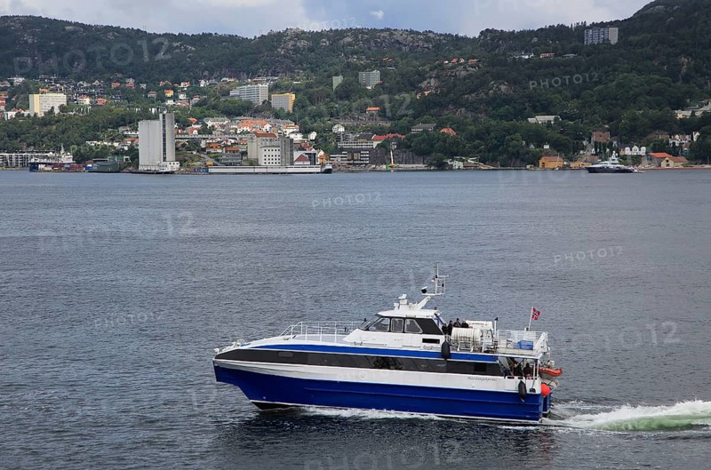 Fast small water taxi ferry boat service in city of Bergen, Norway, Europe