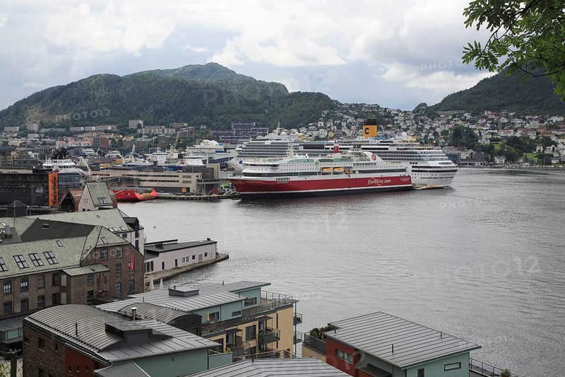 Fjordline ferry ship and cruise ship in docks, city of Bergen, Norway, Europe