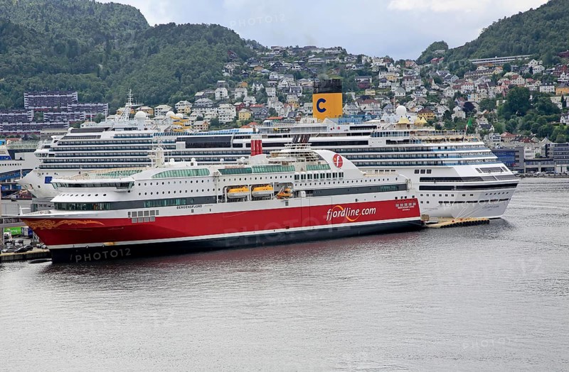 Fjordline ferry ship and cruise ship in docks, city of Bergen, Norway, Europe