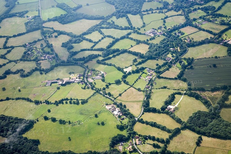A patchwork of fields seen from the air near Gatwick airport, London, England, UK