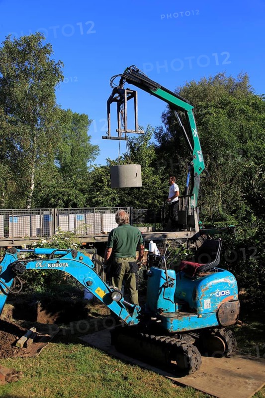 Delivery and installation of concrete ring for domestic septic tank system, Suffolk, England, UK