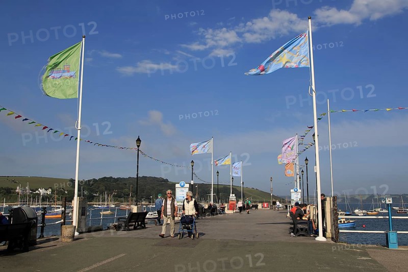 Flags flying on Prince of Wales pier, Falmouth, Cornwall, England, UK