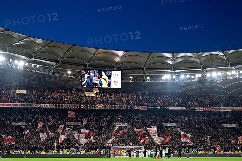 VfB Stuttgart players celebrate after victory in the Cannstatter Kurve, fan block, fans, fan curve, flags, flags, atmosphere, MHPArena, MHP Arena Stuttgart, Baden-Württemberg, Germany, Europe