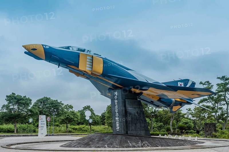 Phantom F-4 fighter jet mounted on stand on permanent display at museum in Jeju, South Korea, Asia