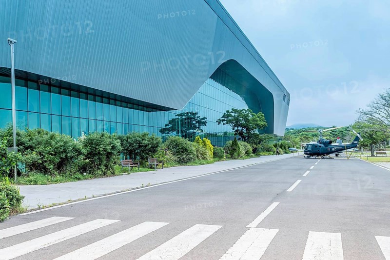 Military helicopter on road in front of aeronautics museum in Jeju, South Korea, Asia
