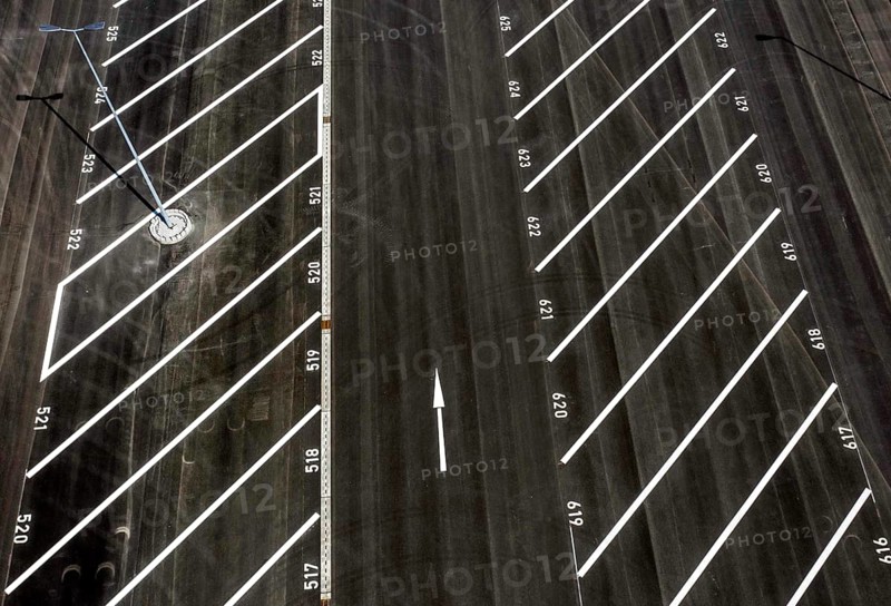 Aerial view of a lorry parking area with streamlined and numbered parking spaces, Grünheide, 23.04.2022