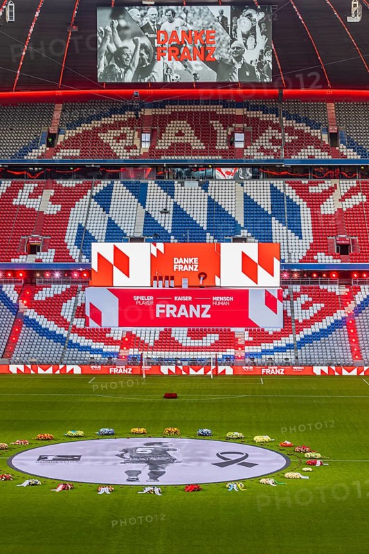 Banner with Franz Beckenbauer and wreaths of flowers, behind the speaker's stage at the end of the event, above on the scoreboard pictures of Franz Beckenbauer with the inscription Danke Franz, funeral service of FC Bayern Munich for Franz Beckenbauer, Allianz Arena, Fröttmaning, Munich, Upper Bavaria, Bavaria