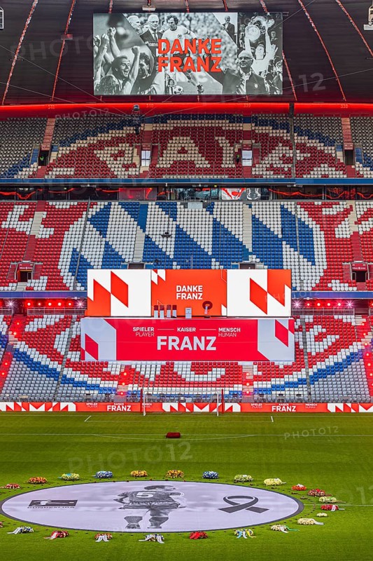 Banner with Franz Beckenbauer and wreaths of flowers, behind the speaker's stage at the end of the event, above on the scoreboard pictures of Franz Beckenbauer with the inscription Danke Franz, funeral service of FC Bayern Munich for Franz Beckenbauer, Allianz Arena, Fröttmaning, Munich, Upper Bavaria, Bavaria