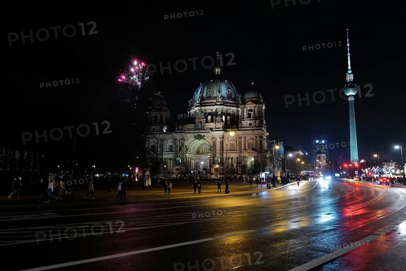 Fireworks in the night as New Year approaches over the Berlin Dome. Berlin, Germany, Europe