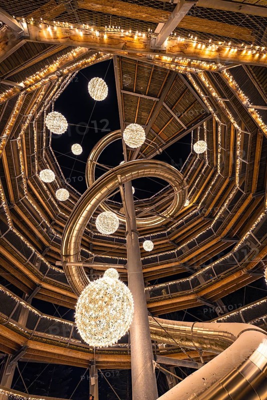 Spiral structure with fairy lights viewed from below, enchanting forest dwellers, treetop walk Bad Wildbad, Black Forest, Germany, Europe