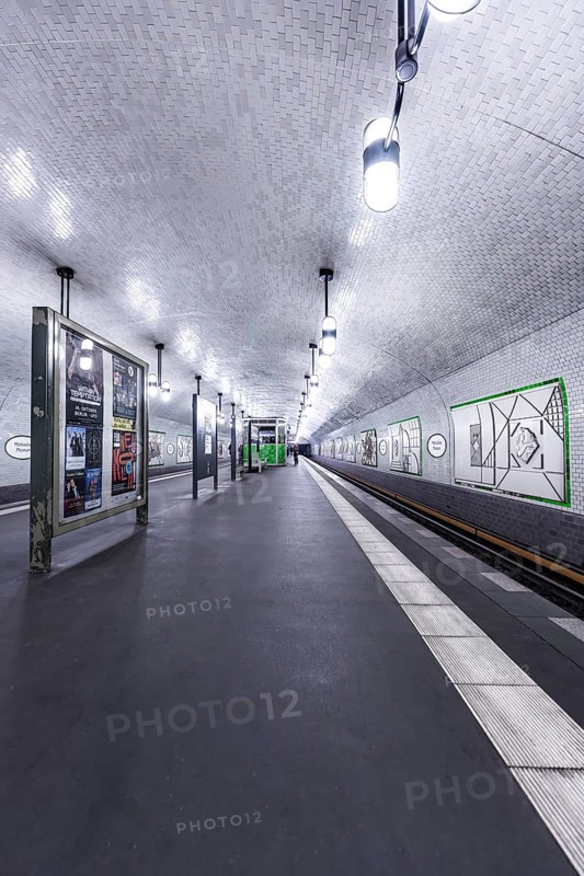 Empty underground station with white tiles and modern design under clear light, Märkisches Museum, Berlin, Germany, Europe