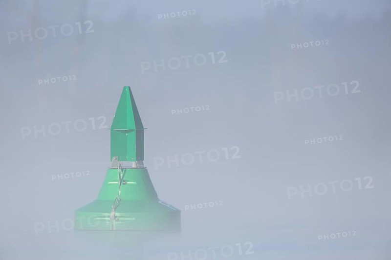 Foggy mood in the morning on the river Peene, fairway buoy in the fog, Flusslandschaft Peenetal nature park Park, Mecklenburg-Western Pomerania, Germany, Europe