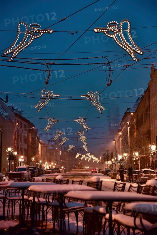 The snow-covered Maximilianstraße with Christmas lights in Augsburg, Swabia, Bavaria, Germany, Europe