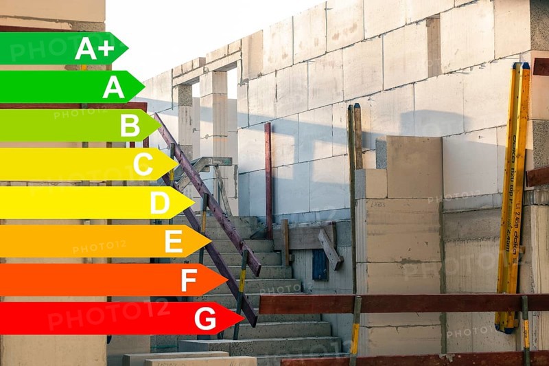Construction site of a new housing estate, graphic with energy efficiency classes for buildings according to the GEG, Düsseldorf, Germany, Europe