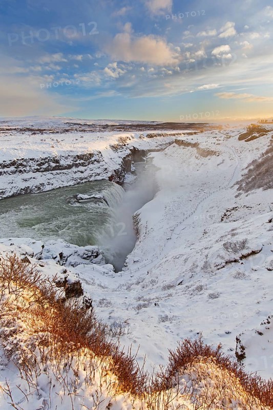Gullfoss waterfall in the snow in winter located in the canyon of Hvítá river, Haukadalur, southwest Iceland