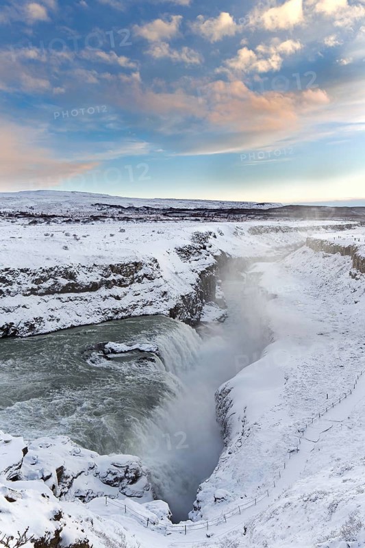 Gullfoss waterfall in the snow in winter located in the canyon of Hvítá river, Haukadalur, southwest Iceland