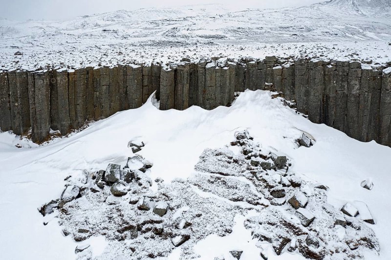 Gerðuberg, Gerduberg basalt columns in winter, cliff of dolerite in the Hnappadalur valley located on the western peninsula Snæfellsnes, Iceland, Europe