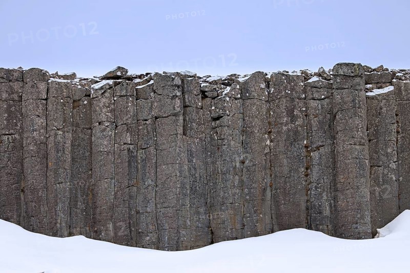 Gerðuberg, Gerduberg basalt columns in winter, cliff of dolerite in the Hnappadalur valley located on the western peninsula Snæfellsnes, Iceland, Europe