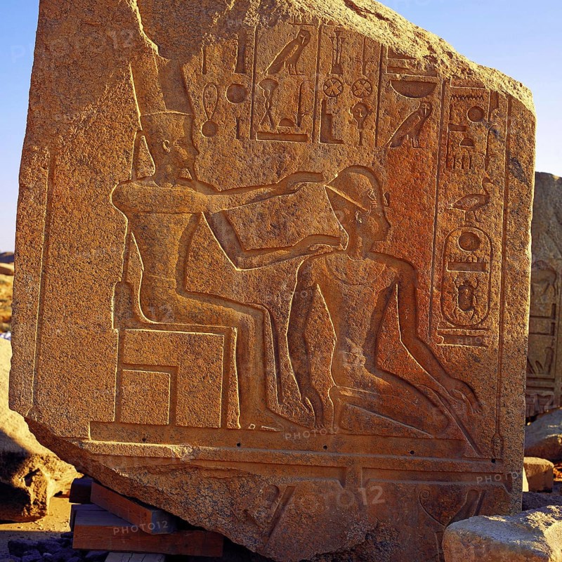 Carved granite block with pharoah and queen at Luxor, Egypt, Africa