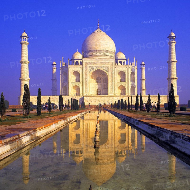 Classic early-morning view of the Taj Mahal reflecting in still water, Agra, India, Asia