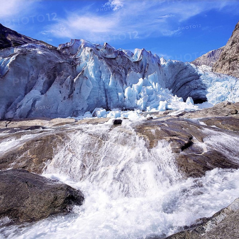 A vigourous melt-water stream issuing from the snout of the Nigardsbreen glacier, Jostedal National Park, Norway, Europe