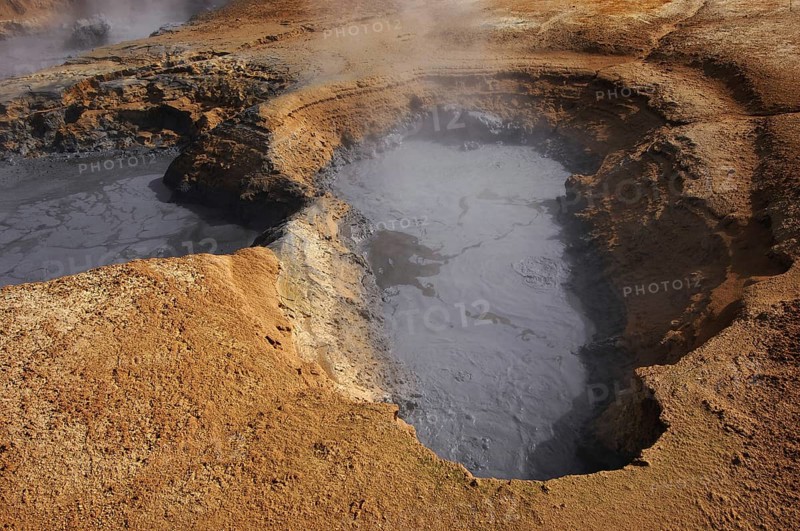Boiling mud-pool in a geothermal landscape at Hverarond near Myvatn, north Iceland