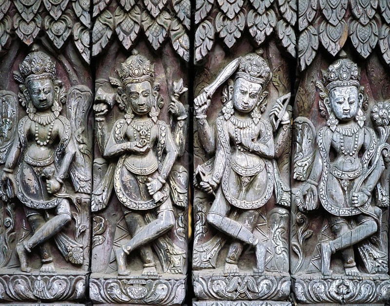 17th century frieze of carved wooden figures in a temple complex in Patan in the Kathmandu valley, Nepal, Asia