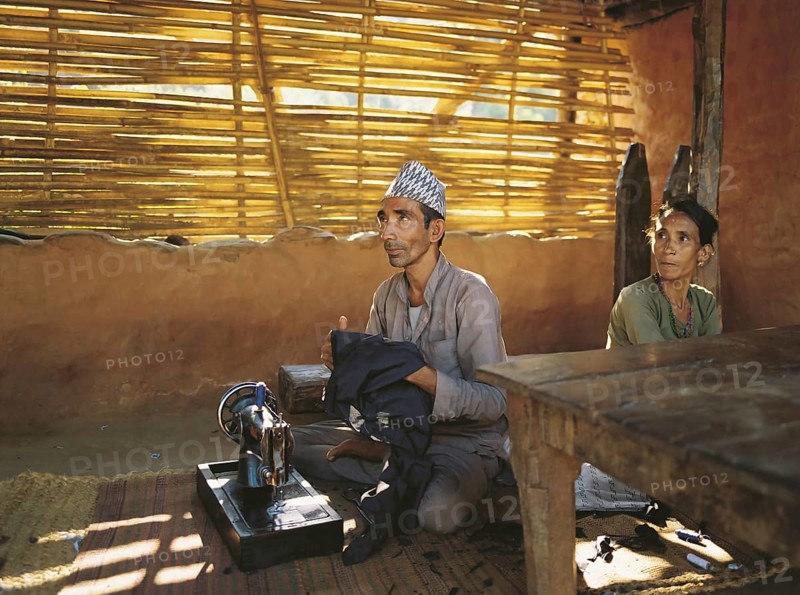 The village tailor and his wife in the village of Sultibari in east Nepal