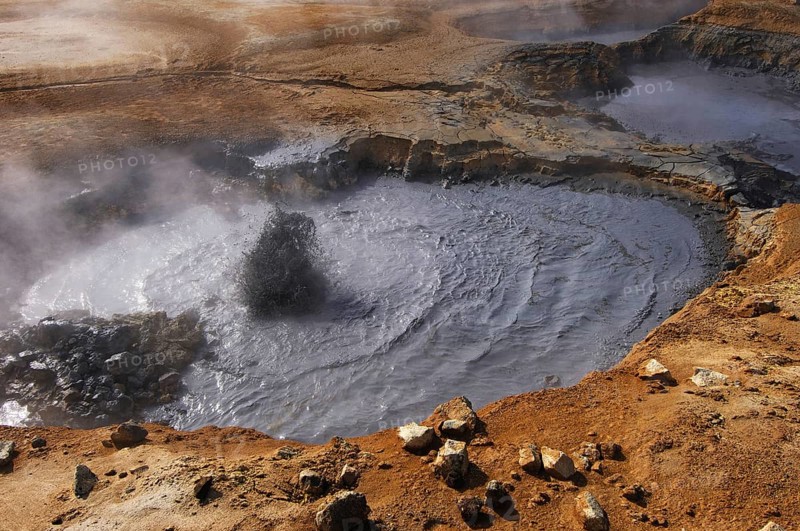 Boiling mud-pool in a geothermal landscape at Hverarond near Myvatn, north Iceland