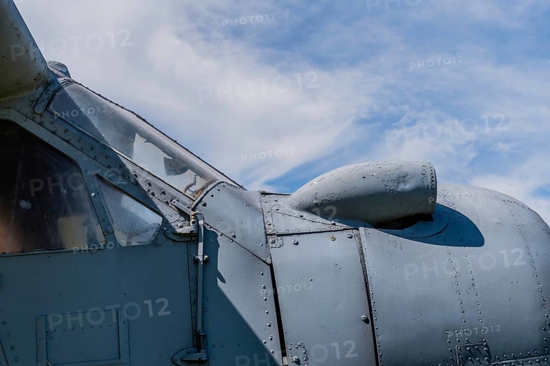 Air intake on top of radial engine cowling of antique airplane on display in public park