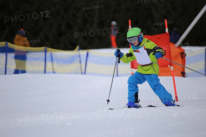 Child at a guest ski race in a ski resort