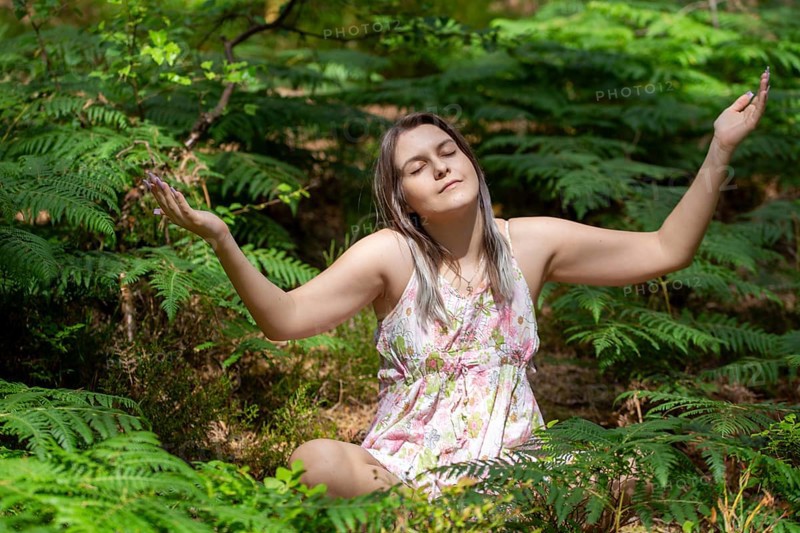 Young woman bathing in the forest (Shinrin Yoku), nature therapy from Japan