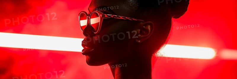 Strong portrait of a woman with glasses, characterised by red neon lines and her silhouette, AI generated, AI generated
