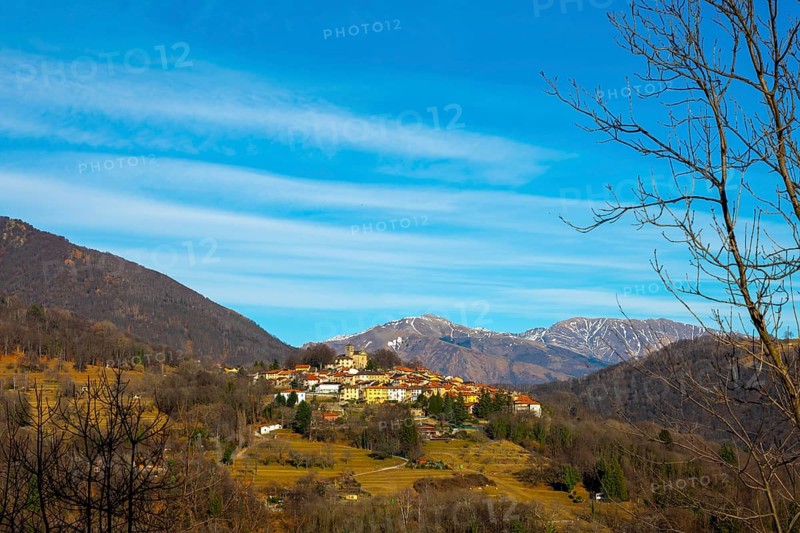 Alpine Village Breno with Mountain View in a Sunny Day in Malcantone, Ticino, Switzerland, Europe