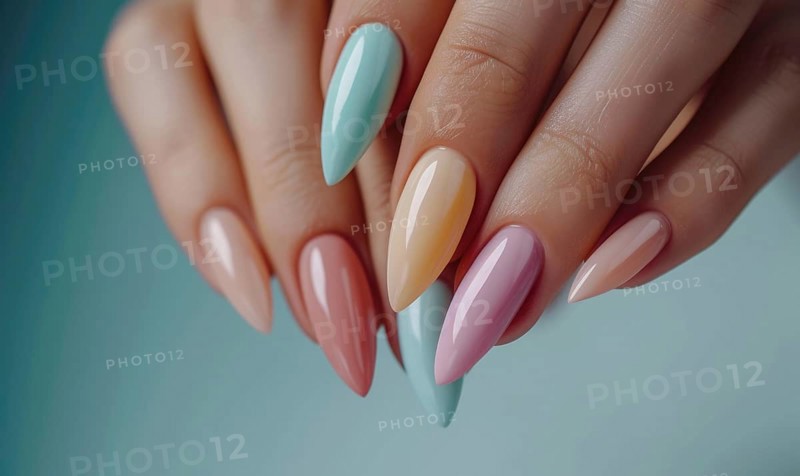 Female hands with pink and beige nail design. Nail polish manicure AI generated