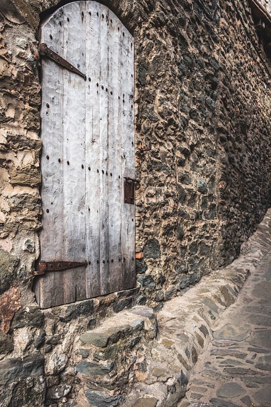 Door detail in Rupit, one of the best known medieval towns in Catalonia in Spain