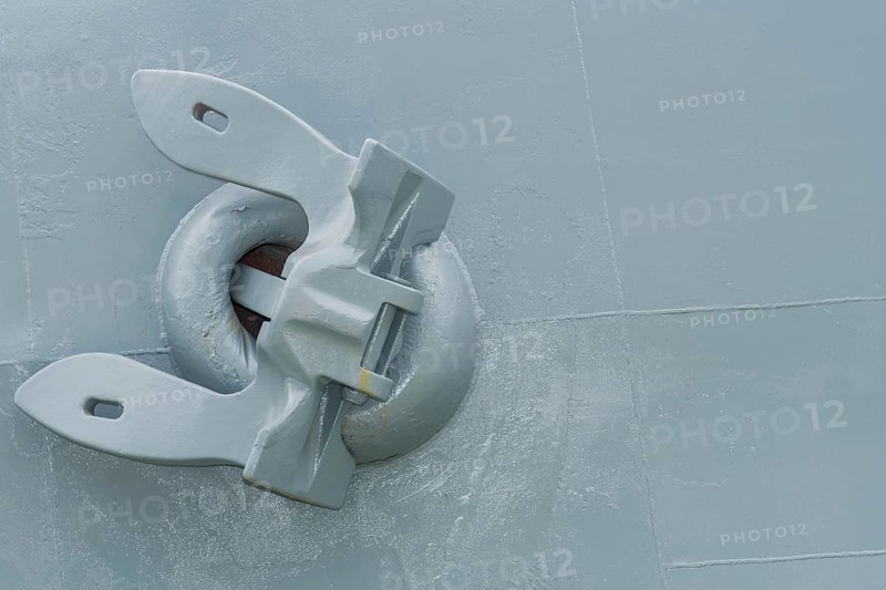 Large metal anchor on side on navel battleship in dry dock in Yeosu, South Korea, Asia