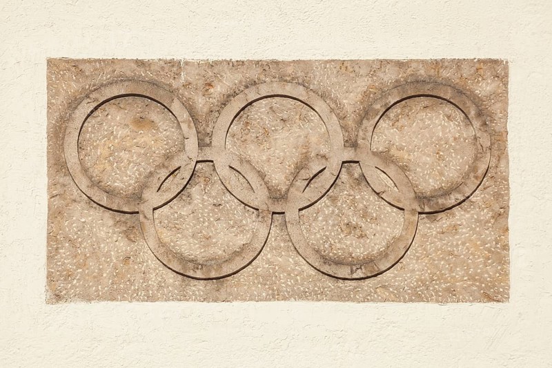 Olympic rings at the Olympic Stadium, 1936 venue of the Winter Games, torchbearer, Garmisch-Partenkirchen, Upper Bavaria, Bavaria, Germany, Europe