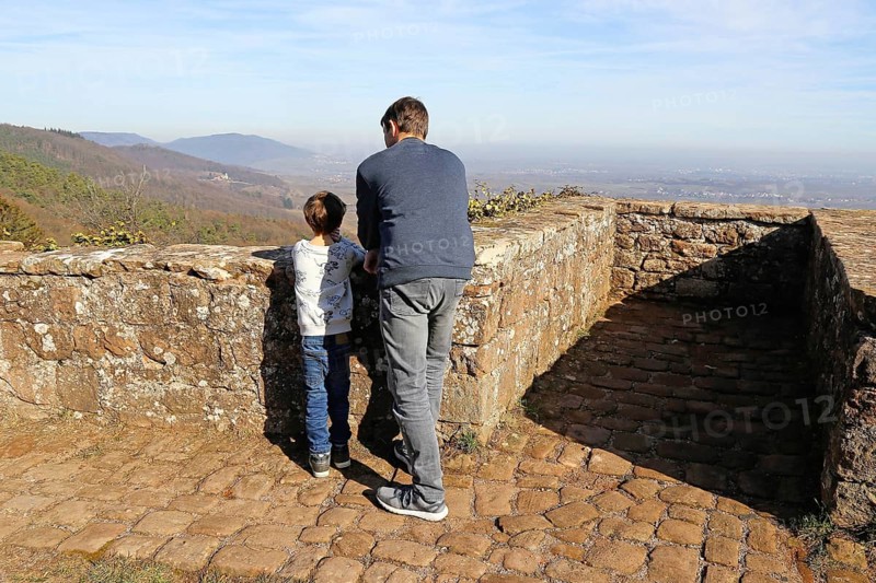 Father and son enjoy the view from Madenburg Castle, Palatinate