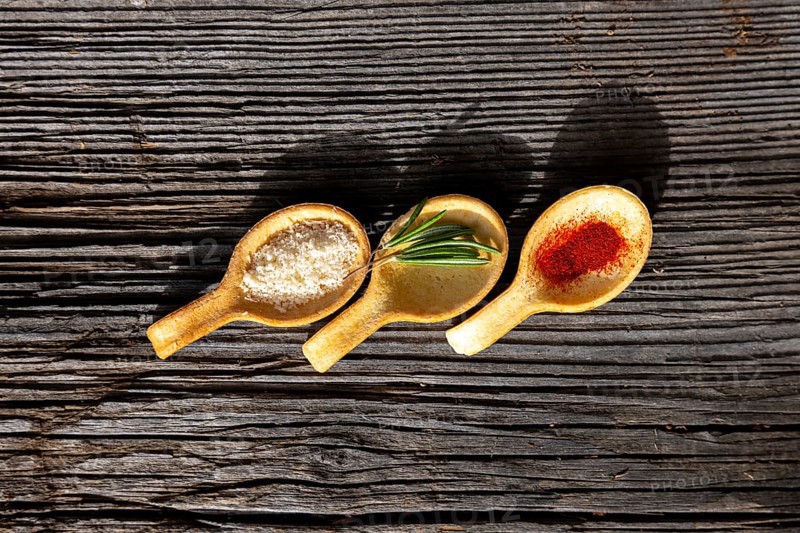 Species in Spoon Like Saffron and Parmesan Cheese and Rosemary with Sunlight in Switzerland