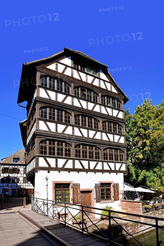 Strasbourg, France, September 2023: Traditional European style half timbered frame house at River 'III' in historical city center, Europe
