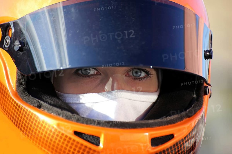 Racer with helmet and balaclava