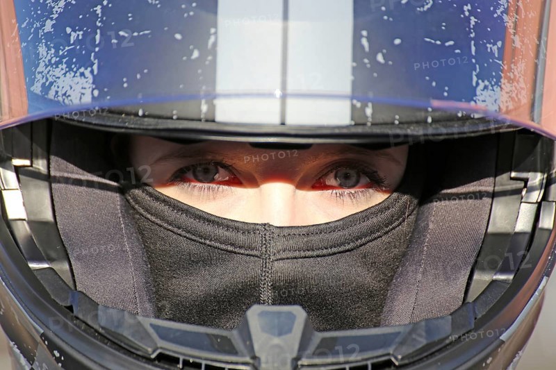Racer with helmet and balaclava