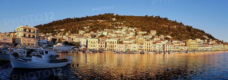 Fishing boats in front of a coastal town, captured in a panorama at dawn, morning light, Gythio, Mani, Peloponnese, Greece, Europe