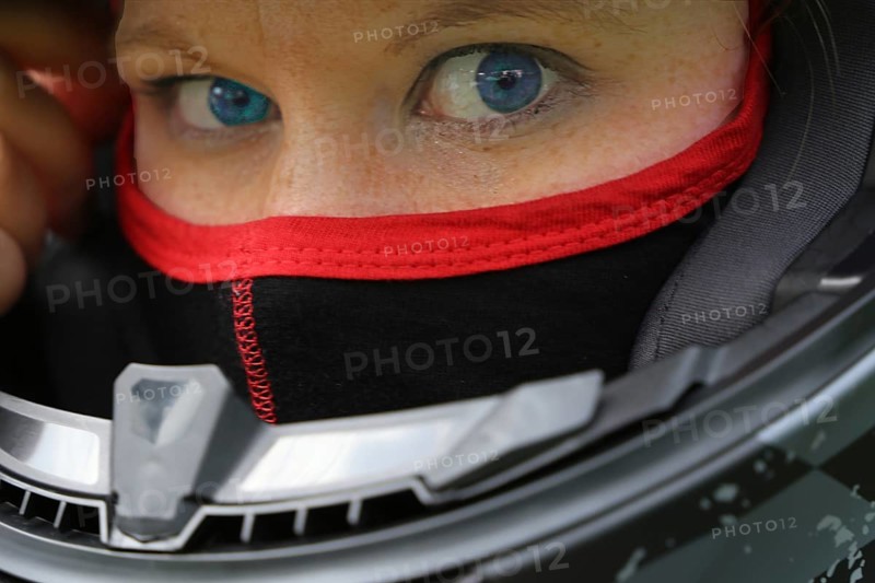 Racer with helmet and balaclava